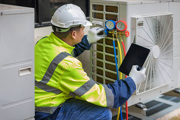 Professional Hvac technician working in Harvard, MA
